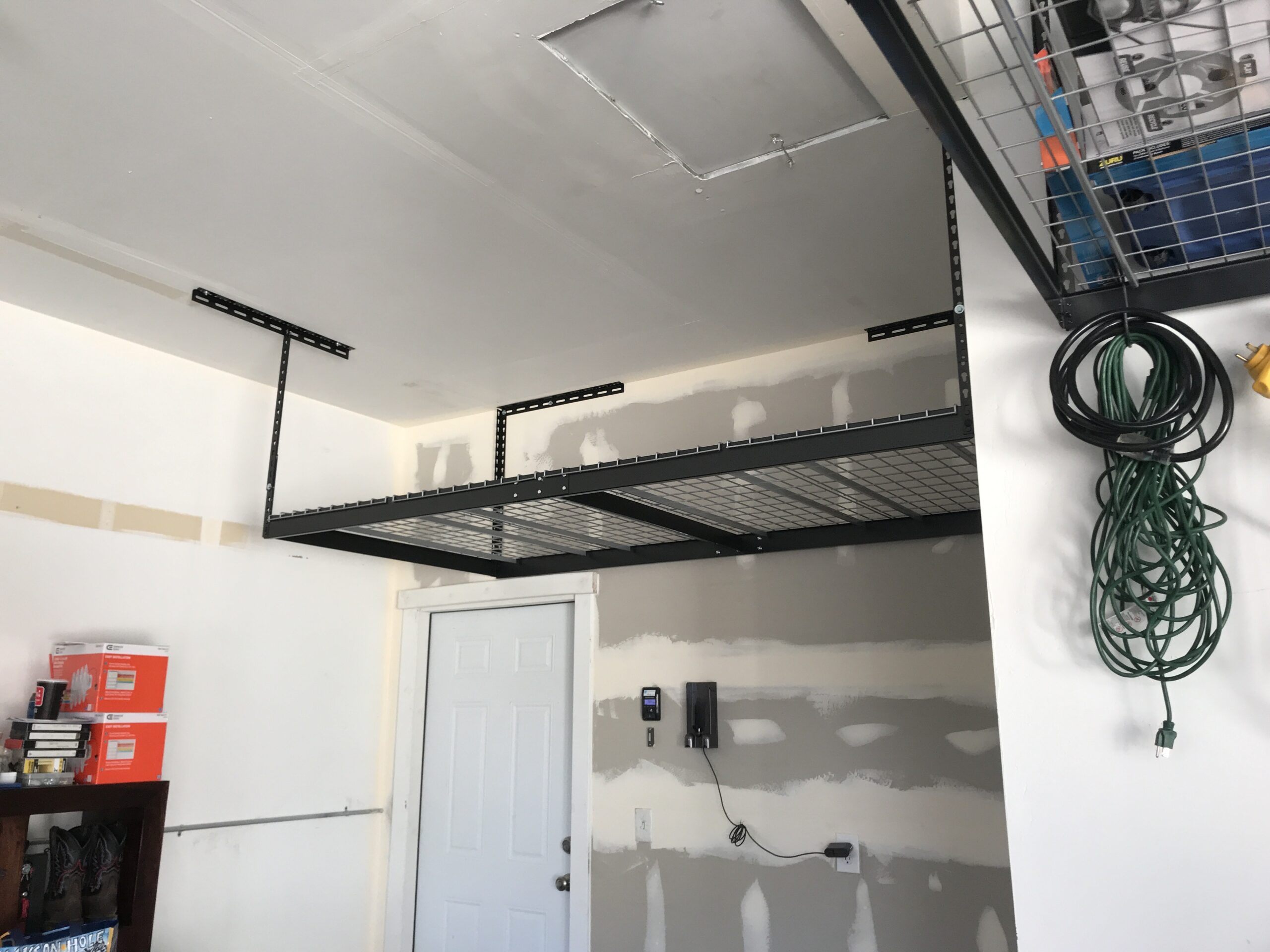 Unlock the Full Potential of Your Garage with Overhead Storage Racks